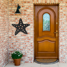 Load image into Gallery viewer, Starfish_Metal_Sign_Black_Brick_Entrance_Mockup.png