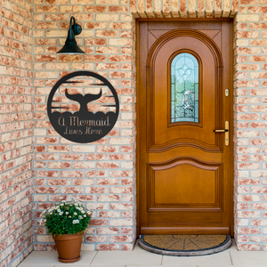 A_Mermaid_Lives_Here_Metal_Sign_Black_Brick_Entrance_Mockup.png