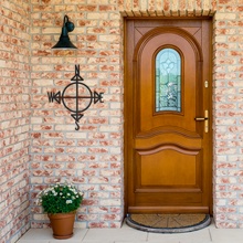 Load image into Gallery viewer, Compass_Metal_Sign_Black_Brick_Entrance_Mockup.png
