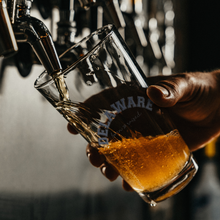 Load image into Gallery viewer, Delaware_Born_and_Raised_Pint_Glass_Pint_Glass_Dark_Lifestyle_Mockup.png
