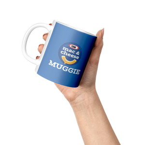 Mac__Cheese_Muggie_Lifestyle_Raised_Hand_LH_Mockup.png