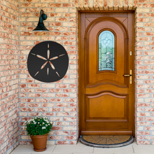 Load image into Gallery viewer, Sand_Dollar_Metal_Sign_Black_Brick_Entrance_Mockup.png
